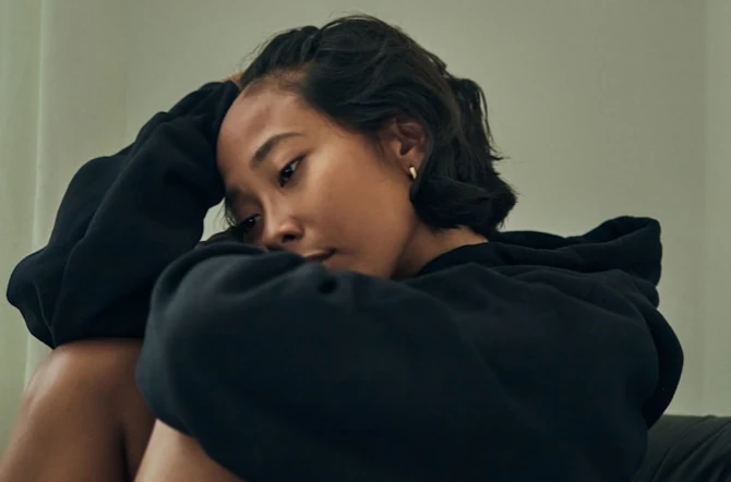 Gloomy teenager in black hoodie